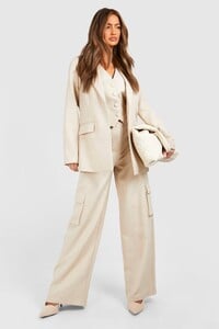 female-natural beige-textured-relaxed-fit-blazer (1).jpg