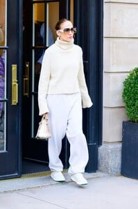 jennifer-lopez-in-a-white-turtleneck-sweater-and-white-sweatpants-in-new-york-04-23-2024-0.jpg