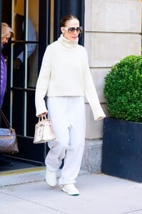 jennifer-lopez-in-a-white-turtleneck-sweater-and-white-sweatpants-in-new-york-04-23-2024-1.jpg