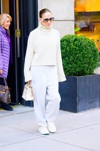 jennifer-lopez-in-a-white-turtleneck-sweater-and-white-sweatpants-in-new-york-04-23-2024-2.jpg