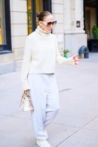 jennifer-lopez-in-a-white-turtleneck-sweater-and-white-sweatpants-in-new-york-04-23-2024-5.jpg