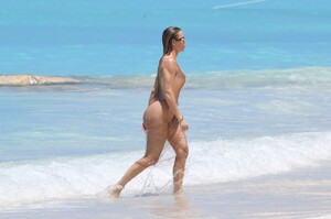 khloe-kardashian-in-metallic-one-piece-swimsuit-in-the-turks-and-caicos-04-03-2024-3.jpg