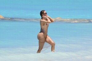 khloe-kardashian-in-metallic-one-piece-swimsuit-in-the-turks-and-caicos-04-03-2024-4.jpg