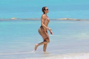 khloe-kardashian-in-metallic-one-piece-swimsuit-in-the-turks-and-caicos-04-03-2024-6.jpg