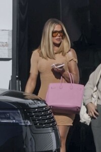 khloe-kardashian-wearing-a-short-fitted-beige-dress-in-los-angeles-04-12-2024-2.jpg