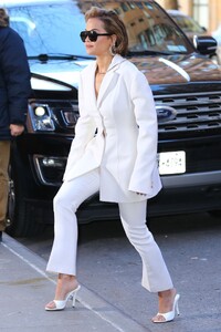 rita-ora-wears-a-white-pant-suit-and-white-mules-to-the-view-in-new-york-02-16-2024-5.jpg