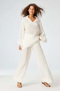 57_TUNICANDLOWWAISTWIDELEGPANT_WHITEGAUZE_0029_01c44b41-3dd5-4a8a-876d-9290c619428b.webp