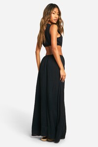 female-black-wide-leg-leather-look-trousers.jpg