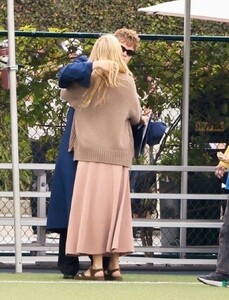 gwyneth-paltrow-and-chris-martin-reunite-to-watch-their-son-moses-graduate-from-high-school-05-31-2024-2.jpg
