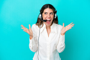 telemarketer-italian-woman-working-with-headset-isolated-blue-background-with-surprise-facial-expression.jpg