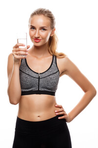 beautiful-sportive-woman-posing-holding-glass-water.jpg