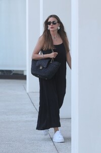 sofia-vergara-in-a-chic-black-dress-white-sneakers-and-a-stylish-black-chanel-handbag-in-beverly-hills-08-02-2024-5.jpg