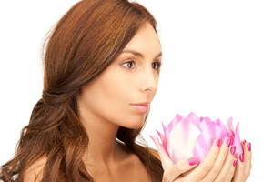 6636156_beautiful-woman-with-lotus-flower.jpg