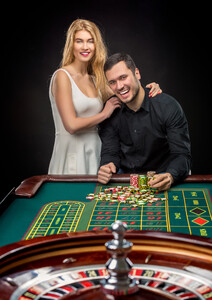 44782294_couple-playing-roulette-wins-at-the-casino.jpg