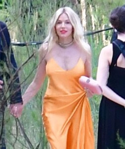 sienna-miller-and-oli-green-at-the-wedding-of-georgia-irwin-and-david-winter-at-la-certosa-island-05-25-2024-1.jpg