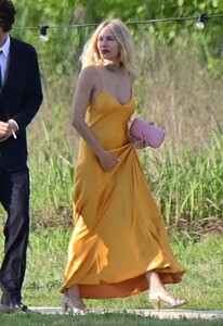 sienna-miller-and-oli-green-at-the-wedding-of-georgia-irwin-and-david-winter-at-la-certosa-island-05-25-2024-3.jpg