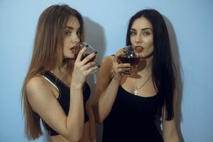 sexy-young-girls-drinks-wine-600nw-562301164.jpg