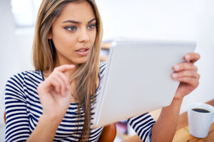 58609270_tablet-research-and-business-woman-in-office-reading-creative-information-on-internet-coffee-planning-and-professional-female-designer-working-on-project-with-digital-technology-in-workplace.jpg