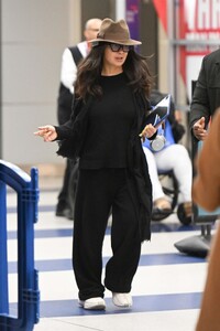 salma-hayek-radiates-chic-comfort-on-arrival-at-jfk-in-nyc-10-28-2024-1.jpg