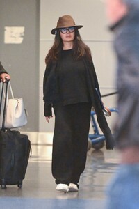 salma-hayek-radiates-chic-comfort-on-arrival-at-jfk-in-nyc-10-28-2024-4.jpg