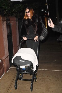 hailey-bieber-out-with-baby-in-rainy-city-01.31.2025-5.jpg