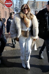 jennifer-lopez-stuns-in-hermes-white-and-ysl-fur-at-sundance-spider-woman-premiere-2.jpg