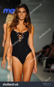 stock-photo-miami-beach-fl-july-a-model-walks-the-runway-at-the-issa-demar-runway-at-funkshion-swim-691582321.jpg