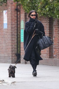 irina-shayk-pairs-black-outfit-with-puppy-02.20.2025-5.jpg