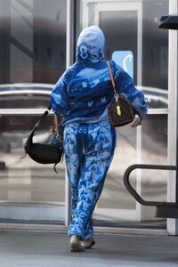 rihanna-and-a-ap-rocky-return-from-caribbean-vacation-02.26.2025-5.jpg