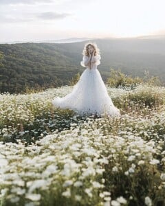 An endless white field of possibilities ✨I love summer for its golden-green hues and tall grass — it feels like stepping into a fairytale. 🌿 Photo @jovanarikalo Model @vanjajagnic Dress @teutamatoshi More of  (3).jpg