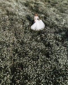 An endless white field of possibilities ✨I love summer for its golden-green hues and tall grass — it feels like stepping into a fairytale. 🌿 Photo @jovanarikalo Model @vanjajagnic Dress @teutamatoshi More of  (5).jpg