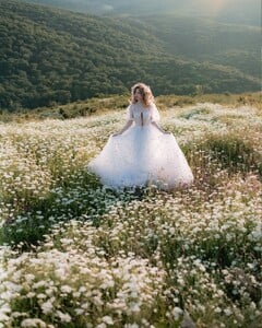 An endless white field of possibilities ✨I love summer for its golden-green hues and tall grass — it feels like stepping into a fairytale. 🌿 Photo @jovanarikalo Model @vanjajagnic Dress @teutamatoshi More of  (6).jpg