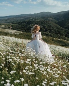 An endless white field of possibilities ✨I love summer for its golden-green hues and tall grass — it feels like stepping into a fairytale. 🌿 Photo @jovanarikalo Model @vanjajagnic Dress @teutamatoshi More of my w.jpg