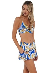 JessT - Sunsets - Bali Bungalow Sporty Swim Skirt Activewear_12 - Quarter pose #1 of Jessica_Sunsets Bali Bungalow Sporty Swim Skirt with hand in pocket.jpg