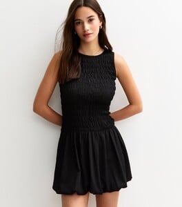 black-shirred-bodice-puffball-hem-mini-dress.jpg