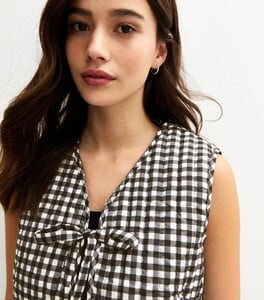 black-sleeveless-gingham-print-padded-jacket3.jpg
