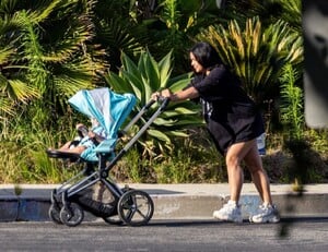 vanessa-hudgens-rocks-graphic-tee-los-angeles-stroll-2.jpg