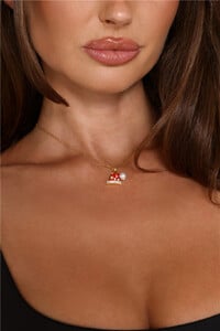 NSole - HMolly - Santa's Hat Necklace Gold - Image 3_039A3811_jpg_1764747325.jpg