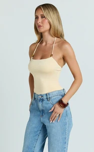 EVenz - Showpo - Abbey_Top_-_Beaded_Halter_Neck_Top_in_Pastel_Yellow_7.webp